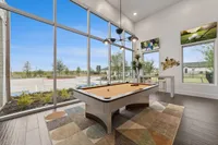 Open living room and kitchen layout in single-family rental home in Denton TX near Rayzor Ranch
