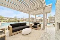 Outdoor patio seating area at Denton TX rental home community near Rayzor Ranch