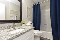 Granite Throughout with Custom Tile Arrounds