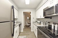 Kitchen with granite counters and stainless appliances