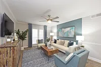 Spacious living room with hardwood-style flooring