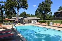 Pool area with lounge chairs