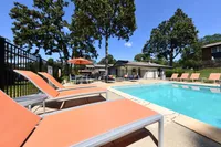 Pool area with lounge chairs