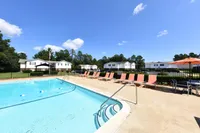 Pool area with lounge chairs
