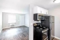 Hardwood Style Flooring + Stainless Appliances