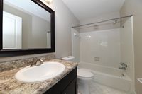 Bright bathroom with bathtub