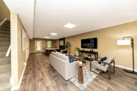 Spacious living room with hardwood-style flooring
