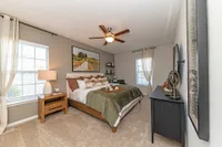 Bedroom with carpet Apartments in Piedmont