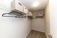 Walk-in closet with built in shelving Apartments in Piedmont