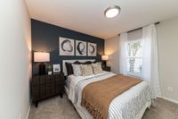 Bedroom with carpet Apartments in Piedmont