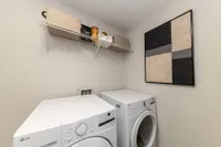 Laundry room with built-in shelving