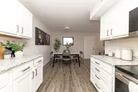 Kitchen with granite counters and modern cabinetry