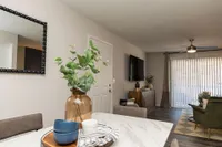 Dining area & living room with hardwood style flooring
