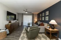 Spacious living room with hardwood-style flooring