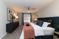 Cozy bedroom suite with carpet