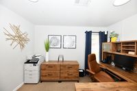 Explore this stylish home office, offering functionality and elegance in one space.