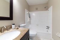 Experience relaxation in this elegant bathroom designed for style and comfort.
