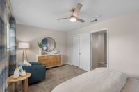 Bedroom with carpet & ceiling fan