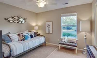 Bedroom with carpet
