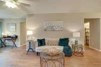 Spacious living room with hardwood-style flooring