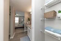 Bathroom with built in shelving for storage