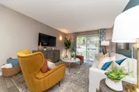 Spacious living room with hardwood-style flooring