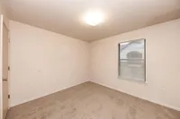 Cozy bedroom with carpet