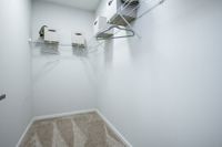 Walk-in closet with built in shelving