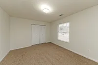 Bedroom with carpet