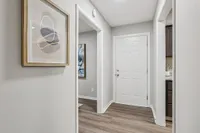 Entry way with hardwood-style flooring