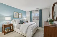 Cozy bedroom with carpet