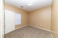 Bedroom with carpet