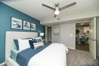 Bedroom with carpet & ceiling fan