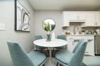 Dining area with hardwood-style flooring