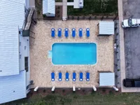 Swimming Pool and Sundeck with Cabanas