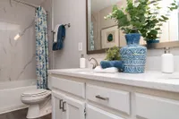 Bright bathroom with quartz counters