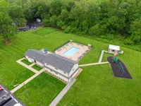 Aerial View of Our Amenities: Swimming Pool, Playground & Bark Park!