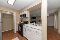 Kitchen with quartz counters & modern cabinetry
