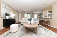 Spacious living room with hardwood-style flooring