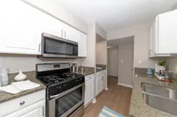 Kitchen with granite counters and stainless appliances