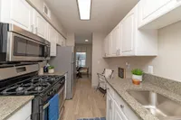 Kitchen with granite counters and stainless appliances
