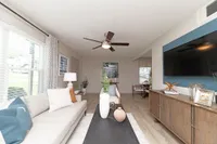 Spacious living room with hardwood-style flooring