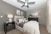 Bedroom with carpet & ceiling fan