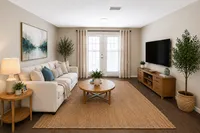 Spacious living room with hardwood-style flooring