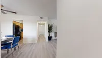 Entry way with hardwood-style flooring