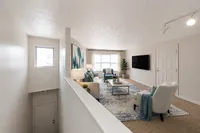 Second level with carpet and over-head lighting