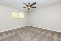 Bedroom with carpet & ceiling fan