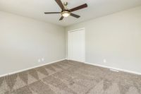 Bedroom with carpet & ceiling fan