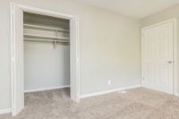 Bedroom with carpet
