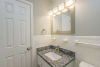 Bright bathroom with granite counters